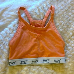 Women’s peach Nike sports bra. Size XS.